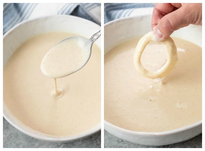 Dipping an onion ring into a bowl of beer batter for an onion rings recipe.