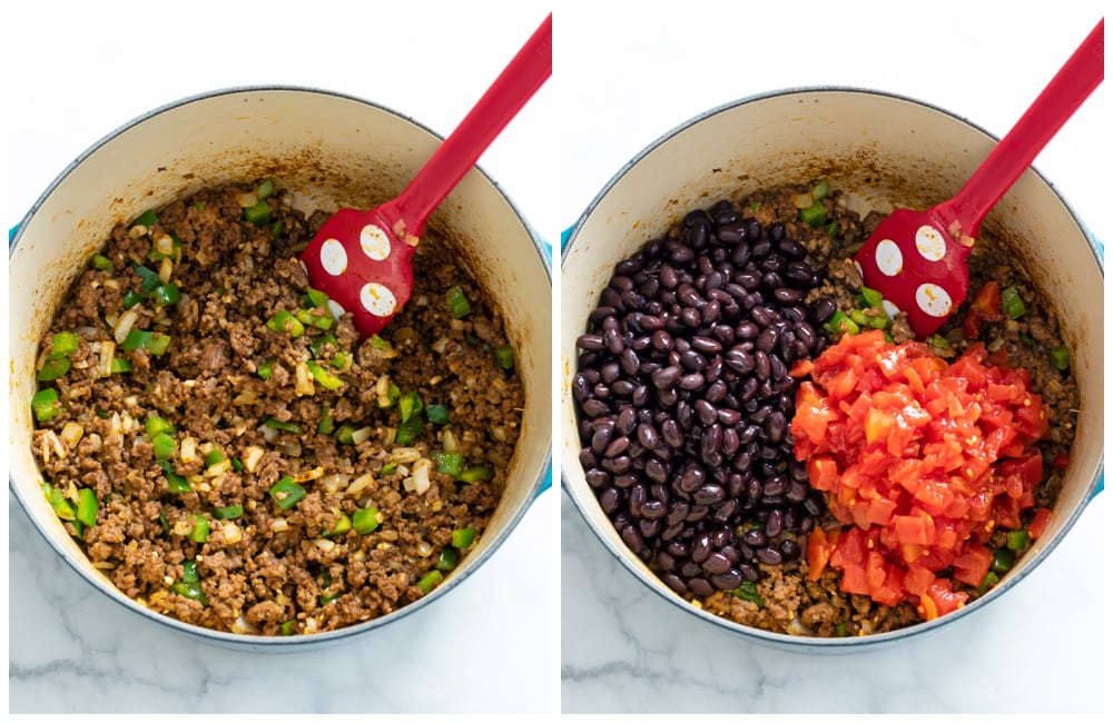 A soup pot filled with seasoned taco meat with black beans and tomatoes being added.